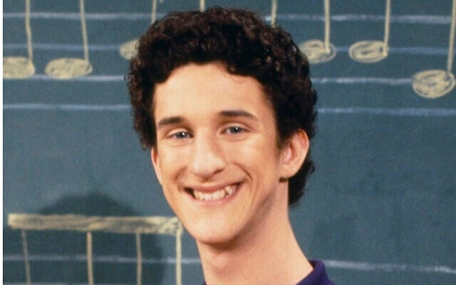 This image released by NBC shows actor Dustin Diamond as Samuel Powers, better known as Screech" from the 1990's series "Saved by the Bell." Diamond died Monday after a three-week fight with carcinoma, according to his representative. He was 44. Diamond was hospitalized last month in Florida and his team disclosed later he had cancer. (Paul Drinkwater/NBCU Photo Bank via AP) This image released by NBC shows actor Dustin Diamond as Samuel Powers, better known as Screech" from the 1990's series "Saved by the Bell." Diamond died Monday after a three-week fight with carcinoma, according to his representative. He was 44. Diamond was hospitalized last month in Florida and his team disclosed later he had cancer. (Paul Drinkwater/NBCU Photo Bank via AP)