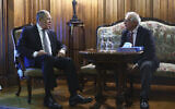 In this photo released by the Russian Foreign Ministry Press Service, Russian Foreign Minister Sergey Lavrov and High Representative of the EU for Foreign Affairs and Security Policy, Josep Borrell, right, talk during their meeting in Moscow, Russia, Friday, February 5, 2021. (Russian Foreign Ministry Press Service via AP)