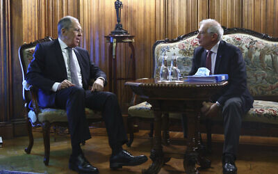 In this photo released by the Russian Foreign Ministry Press Service, Russian Foreign Minister Sergey Lavrov and High Representative of the EU for Foreign Affairs and Security Policy, Josep Borrell, right, talk during their meeting in Moscow, Russia, Friday, February 5, 2021. (Russian Foreign Ministry Press Service via AP)
