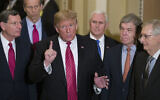In this Wednesday, Jan. 9, 2019 file photo, Sen. John Barrasso, R-Wyo., left, and Sen. John Thune, R-S.D., stand with President Donald Trump, Vice President Mike Pence, Sen. Roy Blunt, R-Mo., and Senate Majority Leader Mitch McConnell of Ky., as Trump speaks while departing after a Senate Republican Policy luncheon, on Capitol Hill in Washington.  (AP Photo/Alex Brandon, File)