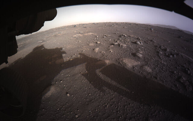 This photo provided by NASA shows the first color image sent by the Perseverance Mars rover after its landing on Thursday, Feb. 18, 2021. (NASA/JPL-Caltech via AP) This photo provided by NASA shows the first color image sent by the Perseverance Mars rover after its landing on Thursday, Feb. 18, 2021. (NASA/JPL-Caltech via AP)