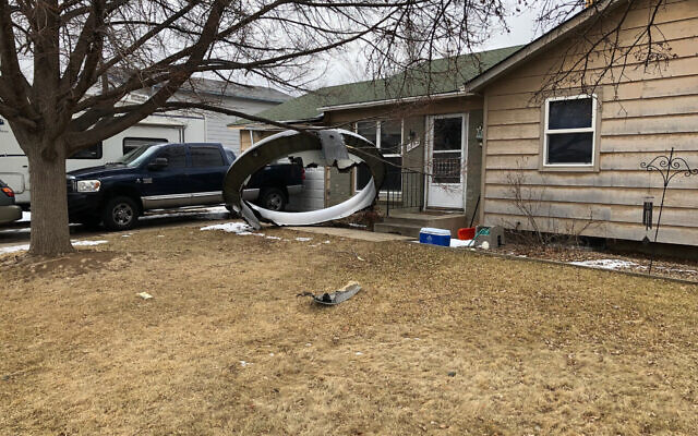 In this photo provided by the Broomfield Police Department on Twitter, debris is scattered in the front yard of a house at near 13th and Elmwood, Saturday, Feb. 20, 2021, in Broomfield, Colorado (Broomfield Police Department via AP) In this photo provided by the Broomfield Police Department on Twitter, debris is scattered in the front yard of a house at near 13th and Elmwood, Saturday, Feb. 20, 2021, in Broomfield, Colorado (Broomfield Police Department via AP)