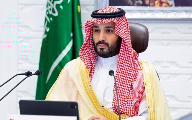 In this November 22, 2020 photo, Saudi Arabia's Crown Prince Mohammed bin Salman attends a virtual G-20 summit held over video conferencing, in Riyadh, Saudi Arabia. (Bandar Aljaloud/Saudi Royal Palace via AP) In this November 22, 2020 photo, Saudi Arabia's Crown Prince Mohammed bin Salman attends a virtual G-20 summit held over video conferencing, in Riyadh, Saudi Arabia. (Bandar Aljaloud/Saudi Royal Palace via AP)