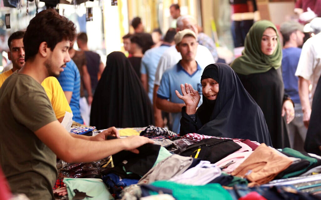 Illustrative: Iraqis shop for Eid al-Fitr at the Shorjah market in central Baghdad, Iraq, Wednesday, June 21, 2017. (AP Photo/Hadi Mizban) Illustrative: Iraqis shop for Eid al-Fitr at the Shorjah market in central Baghdad, Iraq, Wednesday, June 21, 2017. (AP Photo/Hadi Mizban)