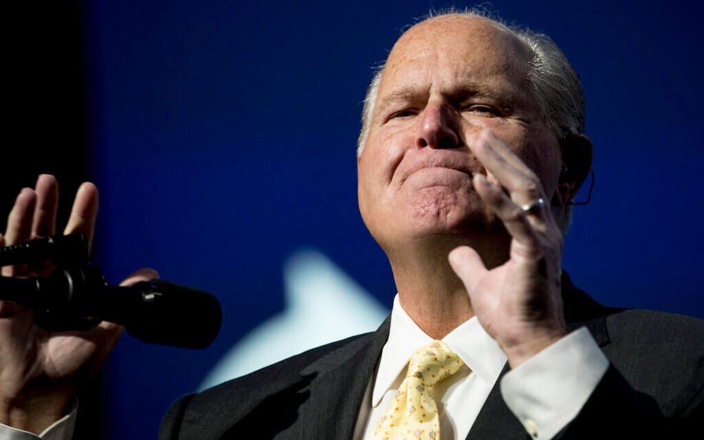 Radio personality Rush Limbaugh speaks before introducing President Donald Trump at the Turning Point USA Student Action Summit at the Palm Beach County Convention Center in West Palm Beach, Fla., Saturday, Dec. 21, 2019. (AP Photo/Andrew Harnik) Radio personality Rush Limbaugh speaks before introducing President Donald Trump at the Turning Point USA Student Action Summit at the Palm Beach County Convention Center in West Palm Beach, Fla., Saturday, Dec. 21, 2019. (AP Photo/Andrew Harnik)