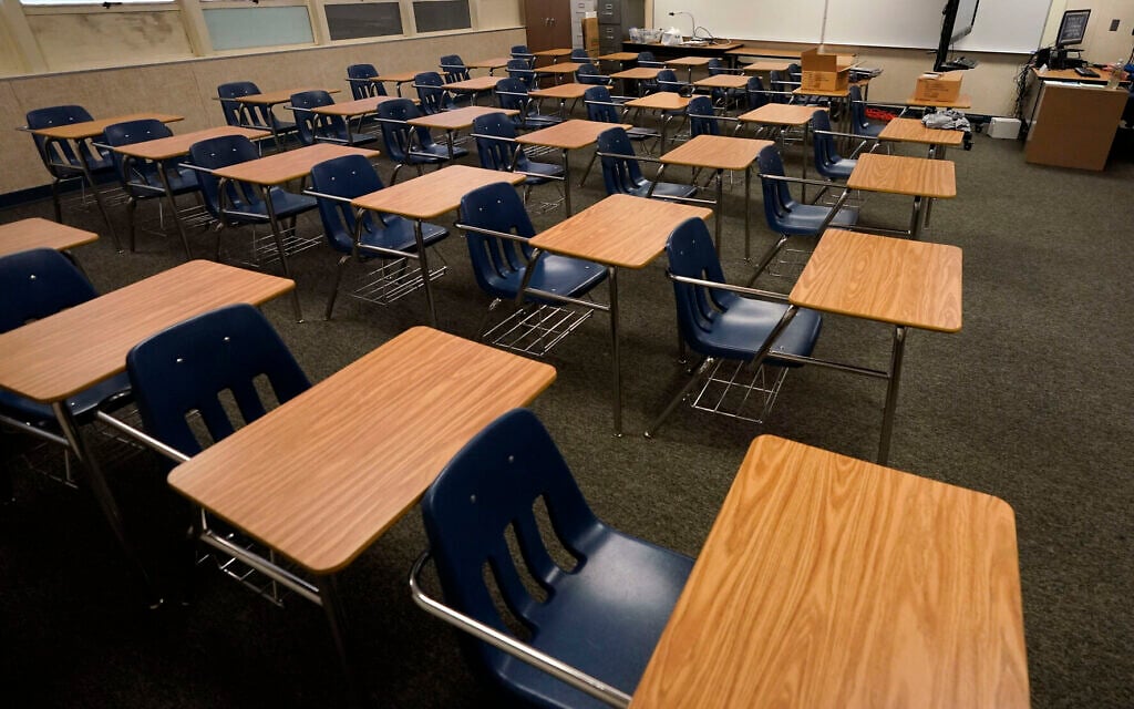 Illustrative: Empty desks at a junior high school in California, October 6, 2020. (AP Photo/Gregory Bull, File) Illustrative: Empty desks at a junior high school in California, October 6, 2020. (AP Photo/Gregory Bull, File)