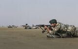 In this photo released Jan. 20, 2021, by the Iranian Army, troops participate in a military drill (Iranian Army via AP)