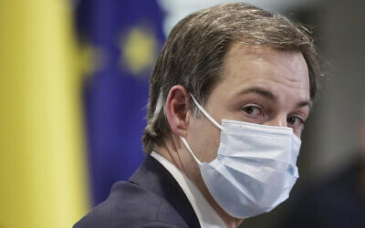 Belgium's Prime Minister Alexander De Croo following a meeting of the consultative committee with ministers of the Federal government, the regional governments and the community governments in Brussels, January 22, 2021. (Olivier Hoslet/Pool Photo via AP)
