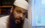 In this image from video made in 2005, Abdul Benbrika, an Algerian-born Muslim cleric, speaks during an interview at his home in Melbourne, Australia. (Australian Broadcasting Corporation via AP)