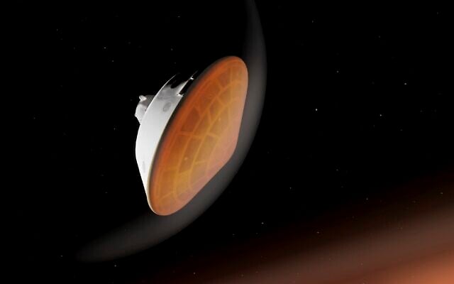 In this illustration made available by NASA, the Perseverance rover, with its heat shield facing the planet, begins its descent through the Martian atmosphere. (NASA/JPL-Caltech via AP)