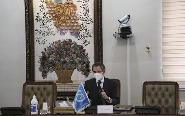 Director General of the International Atomic Energy Agency Rafael Mariano Grossi speaks in a meeting with Iran's atomic chief Ali Akbar Salehi in Tehran, Iran, Sunday, Feb. 21, 2021. Grossi met with Salehi ahead of Iran's plans to partly suspend United Nations inspections of the country's nuclear facilities. (Atomic Energy Organization of Iran via AP) Director General of the International Atomic Energy Agency Rafael Mariano Grossi speaks in a meeting with Iran's atomic chief Ali Akbar Salehi in Tehran, Iran, Sunday, Feb. 21, 2021. Grossi met with Salehi ahead of Iran's plans to partly suspend United Nations inspections of the country's nuclear facilities. (Atomic Energy Organization of Iran via AP)