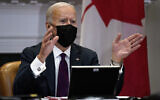 US President Joe Biden holds a virtual bilateral meeting with Canadian Prime Minister Justin Trudeau, in the Roosevelt Room of the White House, Tuesday, Feb. 23, 2021, in Washington. (AP Photo/Evan Vucci)