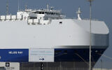 The Israeli-owned cargo ship, Helios Ray, sits docked in port after arriving earlier in Dubai, United Arab Emirates, Feb. 28, 2021  (AP Photo/Kamran Jebreili)