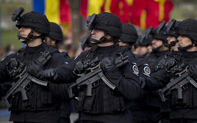 Illustrative: Anti-terrorist units of the Romanian Informations Service (SRI) march during national day celebrations in Bucharest, Romania, Dec. 1, 2015. (AP Photo/Vadim Ghirda)