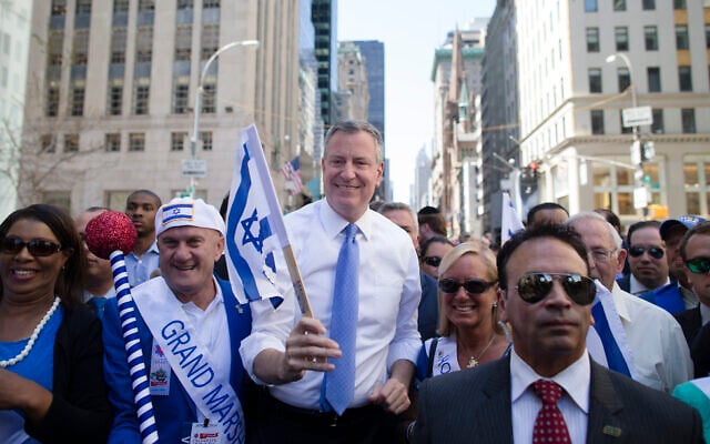 New York City Mayor Bill de Blasio, center, marches up Fifth avenue during the Celebrate Israel Parade, June 1, 2014, in New York. (AP Photo/John Minchillo) New York City Mayor Bill de Blasio, center, marches up Fifth avenue during the Celebrate Israel Parade, June 1, 2014, in New York. (AP Photo/John Minchillo)