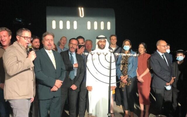 Rabbi Elie Abadie (yellow tie) joins the Jewish community in the UAE for a Hanukkah celebration (photo credit: Courtesy) Rabbi Elie Abadie (yellow tie) joins the Jewish community in the UAE for a Hanukkah celebration (photo credit: Courtesy)