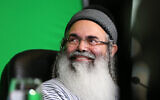 Rabbi Amnon Yitzhak speaks at a lecture in the northern city of Tiberias, on March 3, 2019. (David Cohen/Flash90)