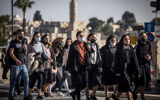 Israelis walk in Jerusalem on February 15, 2021. (Olivier Fitoussi/Flash90) Israelis walk in Jerusalem on February 15, 2021. (Olivier Fitoussi/Flash90)