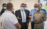 Jerusalem Mayor Moshe Lion seen at the opening of a drive-through site to collect samples for coronavirus testing, at the entrance to the East Jerusalem village of Jabel Mukaber August 18, 2020 (Olivier Fitoussi/Flash90)