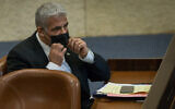 MK Yair Lapid attends a Knesset plenary session at the Knesset in Jerusalem on August 24, 2020 (Oren Ben Hakoon/POOL)
