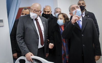 Palestinian Authority Prime Minister Muhammad Shtayyeh opens a hospital for covid-19 in the West Bank city of Nablus, January 16, 2021. (Nasser Ishtayeh/Flash90)