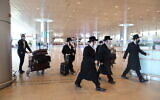 Ultra-Orthodox Israelis at Ben Gurion Airport near Tel Aviv, on January 25, 2021. (Yossi Aloni/Flash90)