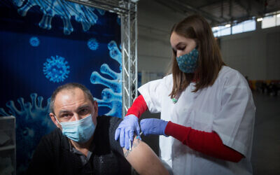 A Clalit Health Service-run vaccination center in Petah Tikva, January 27, 2021. (Miriam Alster/Flash90)