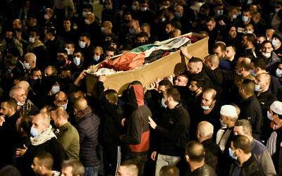 Thousands attend the funeral of 22-year-old nursing student Ahmad Hijazi near the Arab city of Tamra, northern Israel, February 2, 2021 (Sraya Diamant/Flash90)
