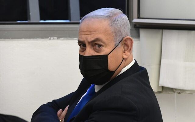 Prime Minister Benjamin Netanyahu at his corruption trial hearing at the Jerusalem District Court, February 8, 2021. (Reuven Castro/Pool) Prime Minister Benjamin Netanyahu at his corruption trial hearing at the Jerusalem District Court, February 8, 2021. (Reuven Castro/Pool)