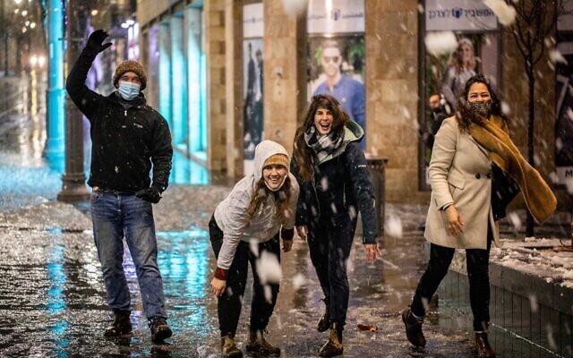 Downtown Jerusalem during a snow storm on February 17, 2021. (Yonatan Sindel/Flash90) Downtown Jerusalem during a snow storm on February 17, 2021. (Yonatan Sindel/Flash90)