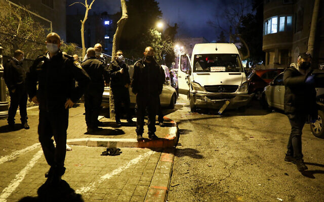 Police at the scene where a man was injured after being hit by a car in the ultra-Orthodox Mea Shearim neighborhood in Jerusalem on February 28, 2021 (Noam Revkin Fenton/Flash90) Police at the scene where a man was injured after being hit by a car in the ultra-Orthodox Mea Shearim neighborhood in Jerusalem on February 28, 2021 (Noam Revkin Fenton/Flash90)
