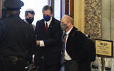 David Schoen, right, arrives prior to the start of opening arguments on the second day of Donald Trump's second impeachment trial, at the US Capitol, February 10, 2021. (Joshua Roberts/Pool/Getty Images)