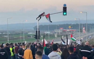 Thousands protest on Saturday, February 6, 2021 in the Arab-Israeli town of Tamra, northeast of Haifa, where a nursing student was killed earlier in the week in a shootout between police and suspected criminals. (Screenshot: Twitter)