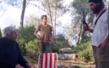 Israeli settlers harass an Arab Israeli family having a picnic outside the village of Jibya in the West Bank on February 6, 2020. (Screen capture/YouTube)