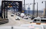Illustrative: Speeding cars and a traffic jam in Jersey City, New Jersey, January 16, 2019. (AP Photo/Julio Cortez)