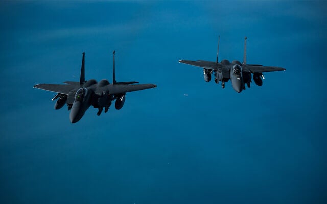 Two US Air Force F-15 Strike Eagles fly over the US Central Command area of responsibility in an undisclosed location, Feb. 10, 2021. (US Air Force/Staff Sgt. Sean Carnes) Two US Air Force F-15 Strike Eagles fly over the US Central Command area of responsibility in an undisclosed location, Feb. 10, 2021. (US Air Force/Staff Sgt. Sean Carnes)