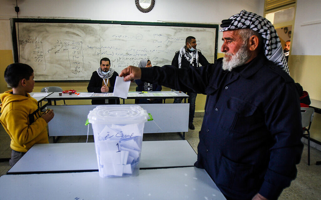 A Palestinian man casts a ballot during elections for the Fatah movment in the Nablus area, on the outskirts of the West Bank city of Nablus, January 23, 2021. (Nasser Ishtayeh/Flash90) A Palestinian man casts a ballot during elections for the Fatah movment in the Nablus area, on the outskirts of the West Bank city of Nablus, January 23, 2021. (Nasser Ishtayeh/Flash90)