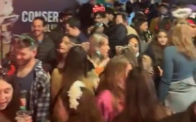 Pre-Purim revelers attend a party in Tel Aviv on February 24, 2021 (screenshot: Twitter) Pre-Purim revelers attend a party in Tel Aviv on February 24, 2021 (screenshot: Twitter)