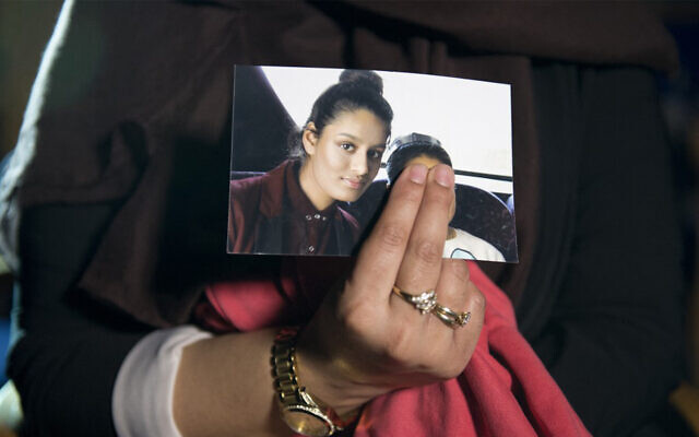 Renu, eldest sister of missing British woman Shamima Begum, holds a picture of her sister while being interviewed by the media in central London, February 22, 2015. (Laura Lean/Pool/AFP) Renu, eldest sister of missing British woman Shamima Begum, holds a picture of her sister while being interviewed by the media in central London, February 22, 2015. (Laura Lean/Pool/AFP)