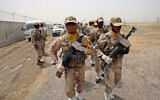 lllustrative: A group of Iranian border guards march at the eastern border of Iran shared with Pakistan and Afghanistan near Zabol, Sistan and Baluchestan Province, Iran, on July 19, 2011. (AP Photo/Vahid Salemi, File)