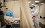 Hospital staff work in the coronavirus ward of Shaare Zedek hospital in Jerusalem on February 3, 2021. (Yonatan Sindel/Flash90)