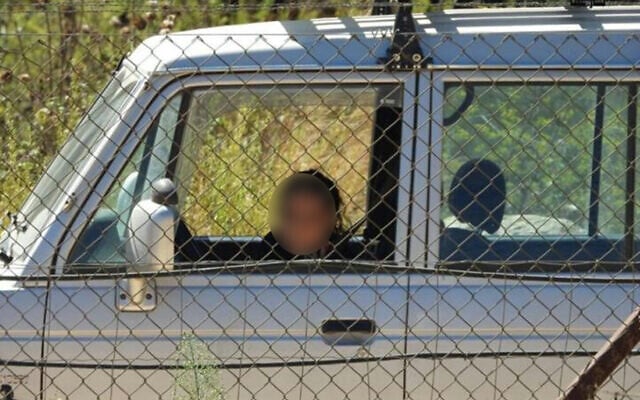A picture released by a Hezbollah affiliated journalist shows an Israeli woman watching the Lebanese border in October 2020. The photo has been altered by The Times of Israel to conceal the woman's identity, in line with censorship requirements. The photo could not be independently verified. (Ali Choeib via Twitter) A picture released by a Hezbollah affiliated journalist shows an Israeli woman watching the Lebanese border in October 2020. The photo has been altered by The Times of Israel to conceal the woman's identity, in line with censorship requirements. The photo could not be independently verified. (Ali Choeib via Twitter)