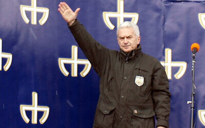 Far-right politician Volen Siderov lifts his arm at a political rally in Sofia, Bulgaria on March 11, 2011. (Wikimedia Commons via JTA)
