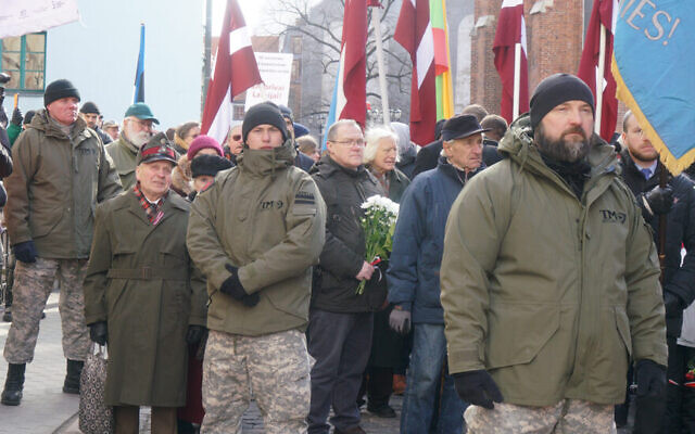 SS veterans and their supporters march in Riga, Latvia on March 16, 2018. (Cnaan Liphshiz via JTA) SS veterans and their supporters march in Riga, Latvia on March 16, 2018. (Cnaan Liphshiz via JTA)