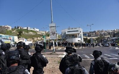 Police disperse a protest against violence in Arab communities, in Umm al-Fahm on February 26, 2021. (Israel Police) Police disperse a protest against violence in Arab communities, in Umm al-Fahm on February 26, 2021. (Israel Police)