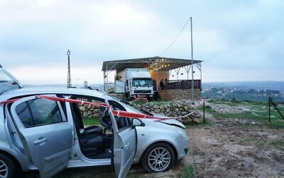 A Palestinian man's car outside the home of an Israeli man on the illegal Sadeh Efraim Farm outpost in the northern West Bank, where the Israeli military says the man attacked someone before being shot dead on February 5, 2021. (Israel Defense Forces)