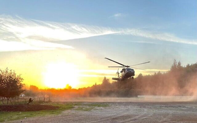 A helicopter flies during an exercise simulating fighting on the Lebanese border in northern Israel on February 10, 2021. (Israel Defense Forces) A helicopter flies during an exercise simulating fighting on the Lebanese border in northern Israel on February 10, 2021. (Israel Defense Forces)