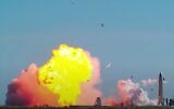 A SpaceX Starship prototype explodes in a fireball as it tries to land upright after a test flight (YouTube screenshot)