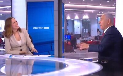 Prime Minister Benjamin Netanyahu gives Channel 12 anchor Yonit Levy his "na na na na na" rendition during an interview on February 17 (Channel 12 screenshot)