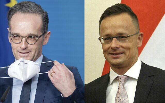 Hungarian Minister of Foreign Affairs and Trade Peter Szijjarto, right, and Heiko Maas, German Foreign Minister, left. (Attila Kovacs/MTI via AP / Kay Nietfeld/dpa via AP) Hungarian Minister of Foreign Affairs and Trade Peter Szijjarto, right, and Heiko Maas, German Foreign Minister, left. (Attila Kovacs/MTI via AP / Kay Nietfeld/dpa via AP)